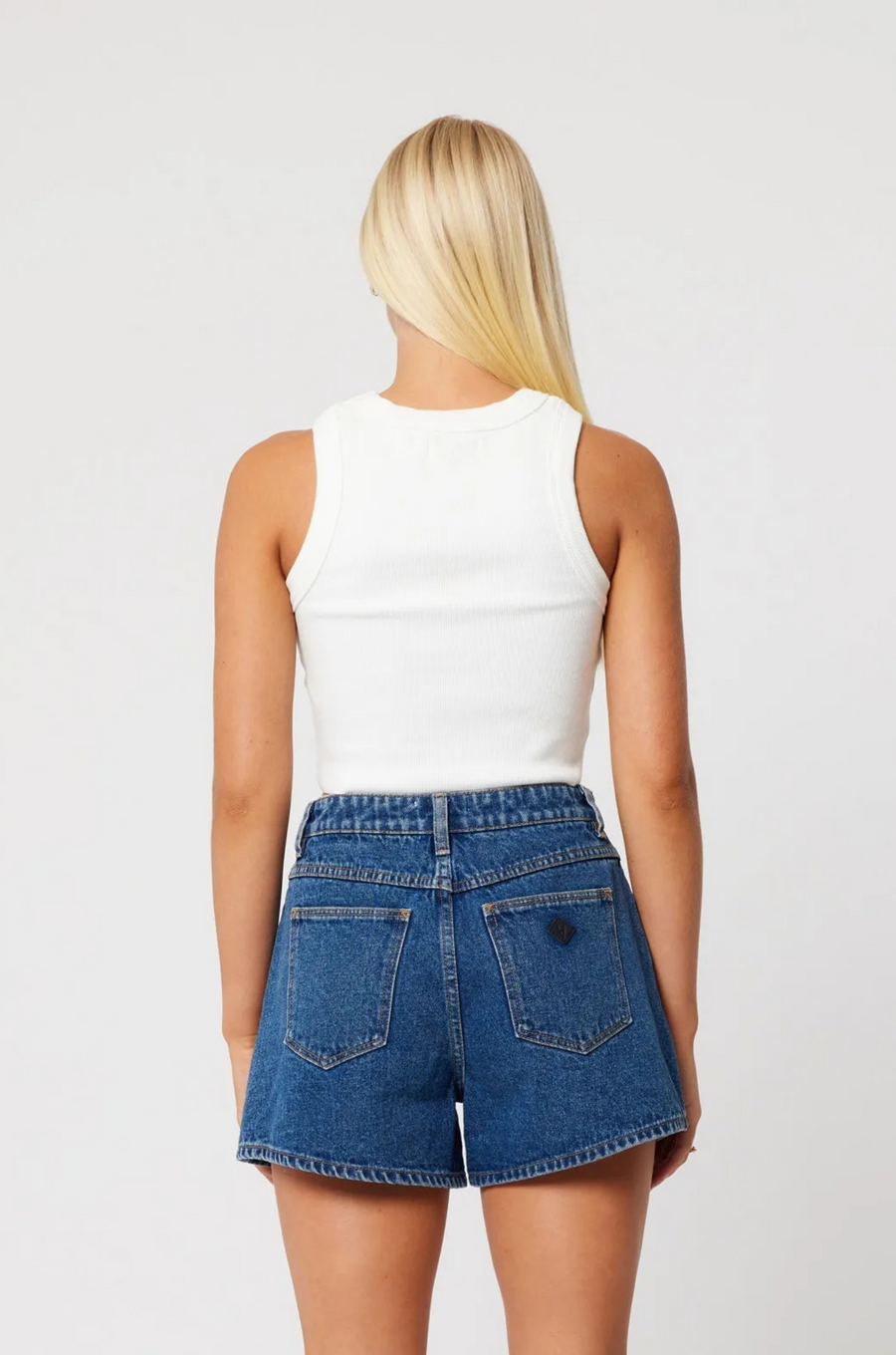 High rise, loose fit denim shorts
medium wash denim shorts
Crafted with a comfort rigid denim meaning they will be fitted when first worn and will slowly soften and mold to your body after wash &amp; wear
Zip fly