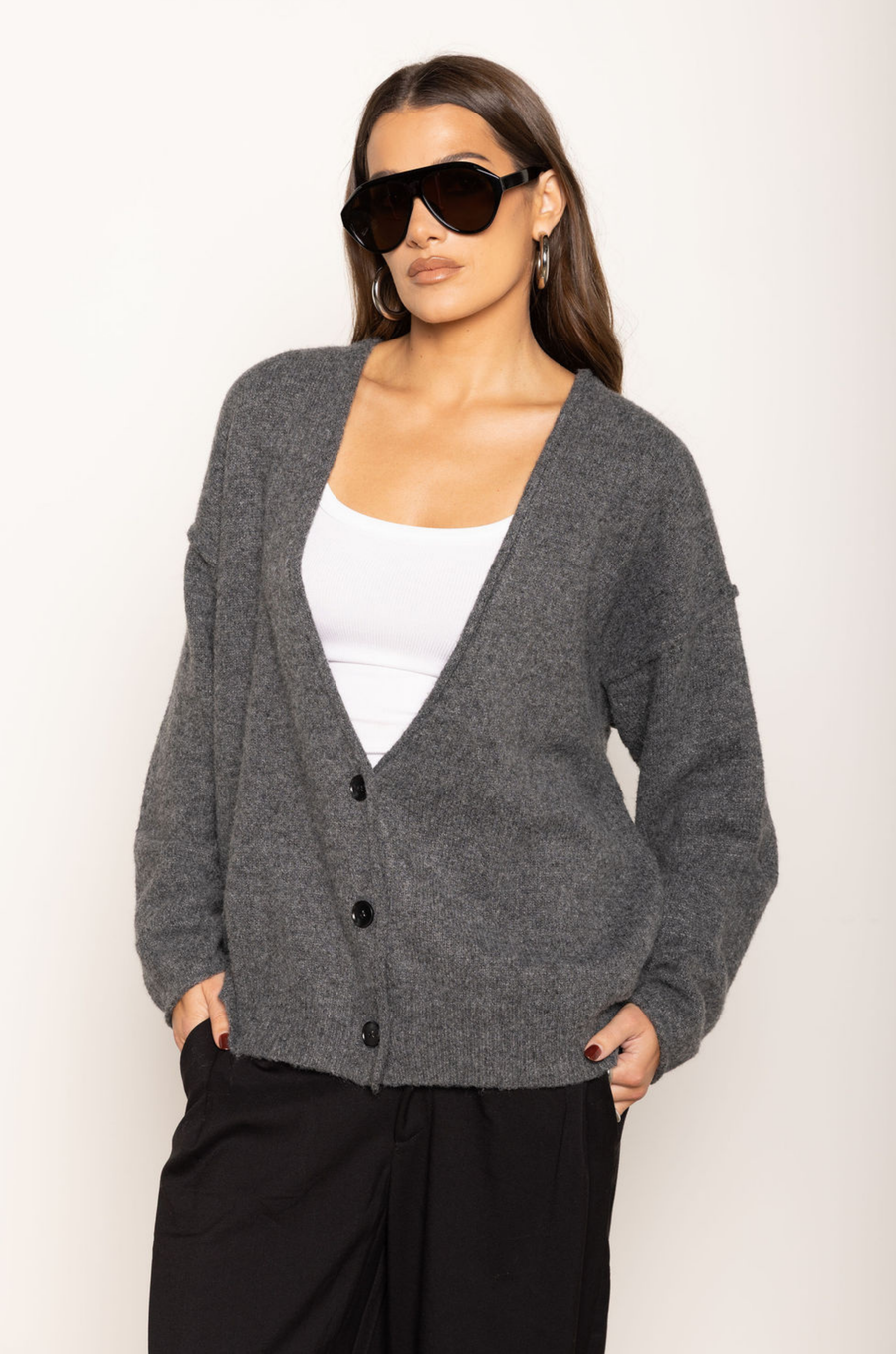 Soft fuzzy knit cardigan
Long sleeve
V-neckline
Button down closure
Unlined
dark grey oversized cardigan
fall outfit
thanksgiving outfit
v neck sweater
v neck cardigan