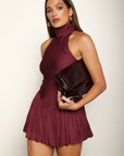 Turtle neck mini dress
Sleeveless
Inner shorts lining
V drop waist
Cinched skirt
Back zipper closure
Partially lined
maroon mini dress
plum mini dress
holiday mini dress
holiday outfit