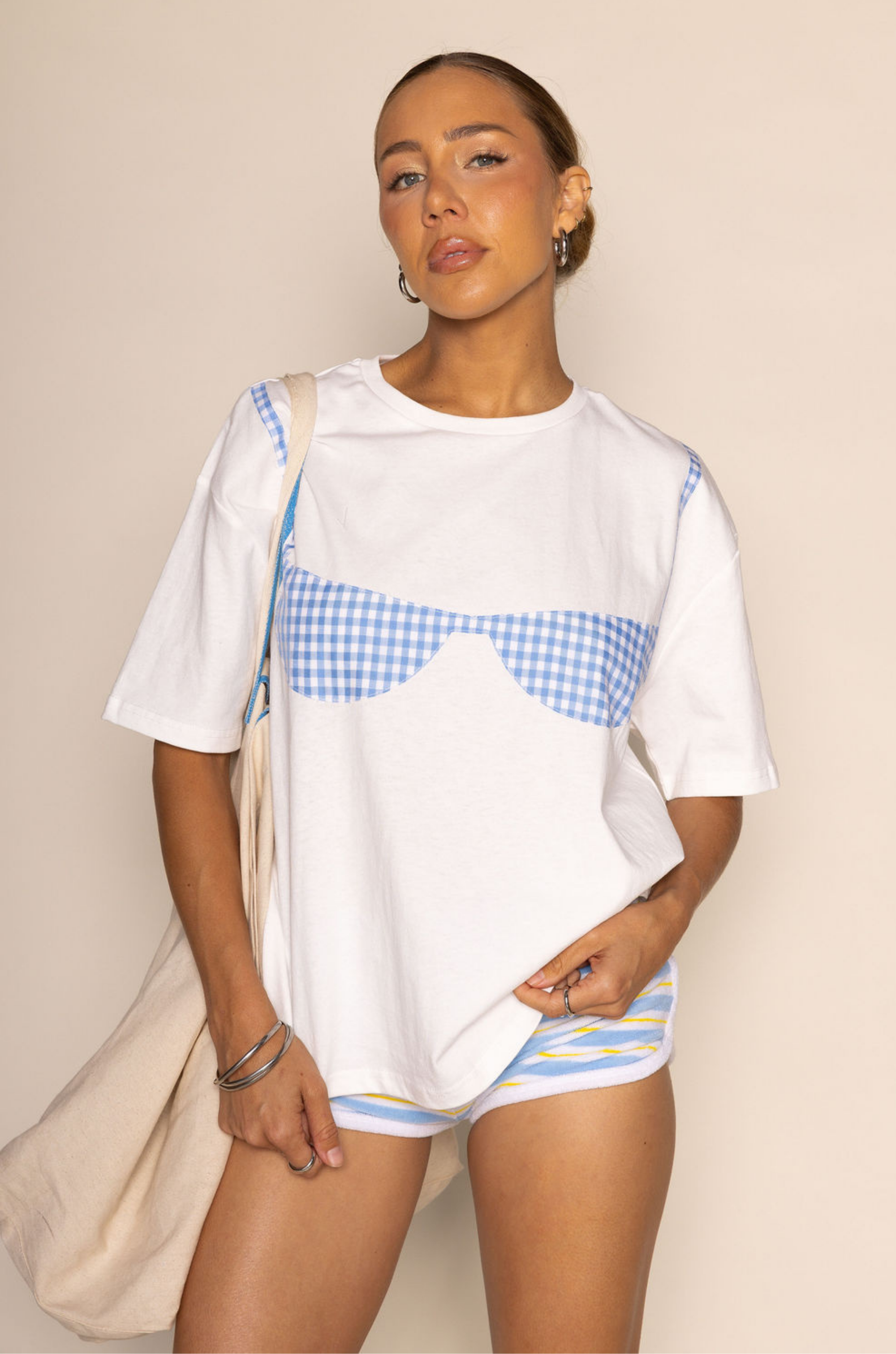 Crewneck oversized bra graphic t-shirt
Gingham bra patch
Unlined
t-shirt with bra on it
t-shirt with bikini top on it
summer top
beach cover up
pool cover up
fourth of july top cover up