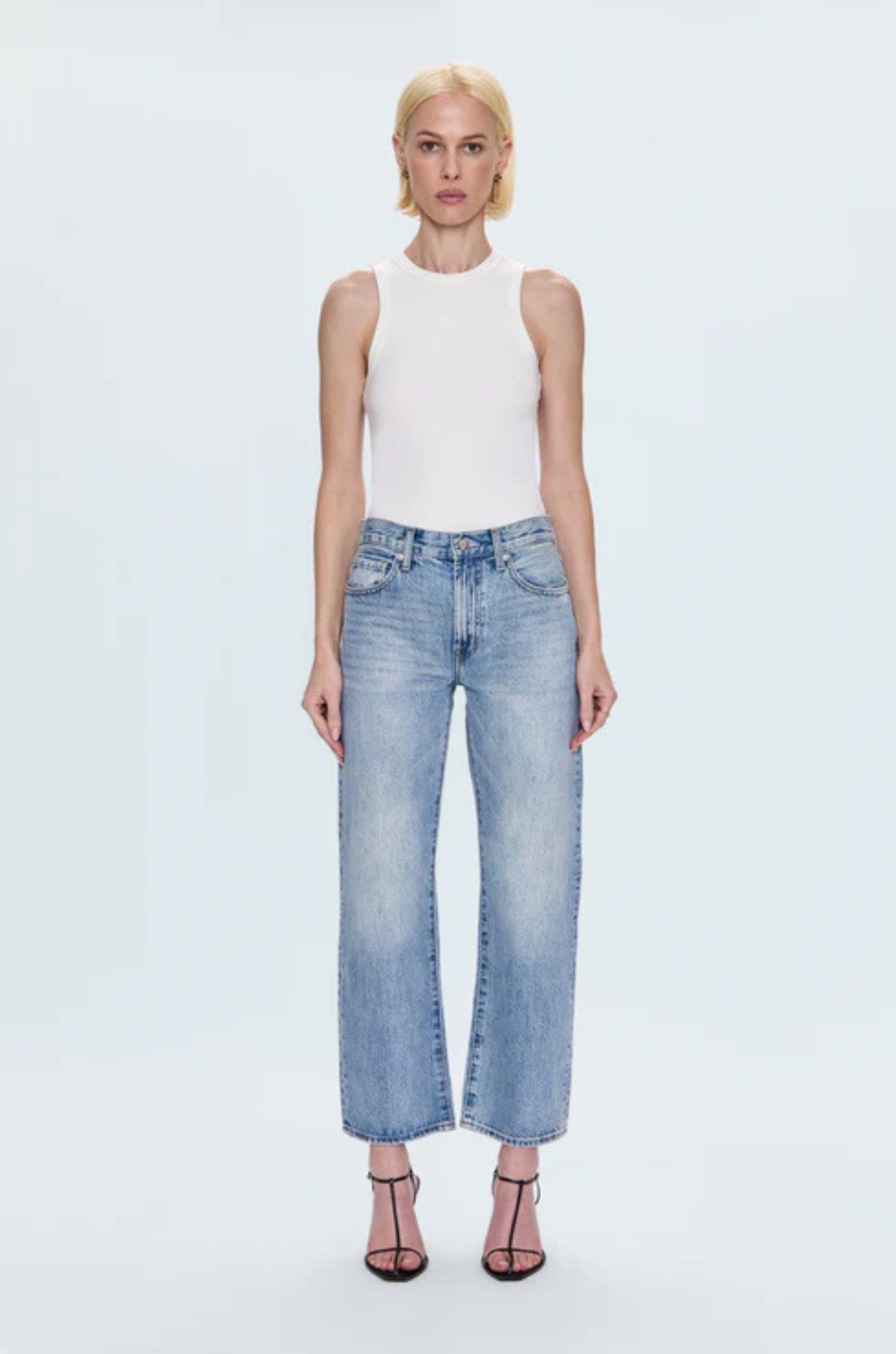 Faded straight leg jeans
Mid rise bowed straight leg jeans
No stretch
Button and zipper fly
Five pocket construction
Rise: 10&quot; / Inseam: 29&quot; / Leg Opening: 17.5&quot;
Cotton
mid to light wash denim jeans