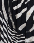 Zebra printed bikini triangle top
Adjustable over the shoulder straps
Adjustable tunneling at underbust
Adjustable ties at back underbust
Fully lined
