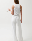 Cut to sit low on the hips
Relaxed rise
Easy adjustable drawstring waist tie
Wide, fluid leg
Constructed from non-stretch denim
Size 26 measurements:
Rise: 11" / Inseam: 32 1/2" / Leg Opening: 24"
Cotton/Lyocell
white denim jeans