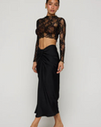 black Shirred maxi skirt
Elastic stretch waist with front tie cinch
Zipper up back closure
Polyester