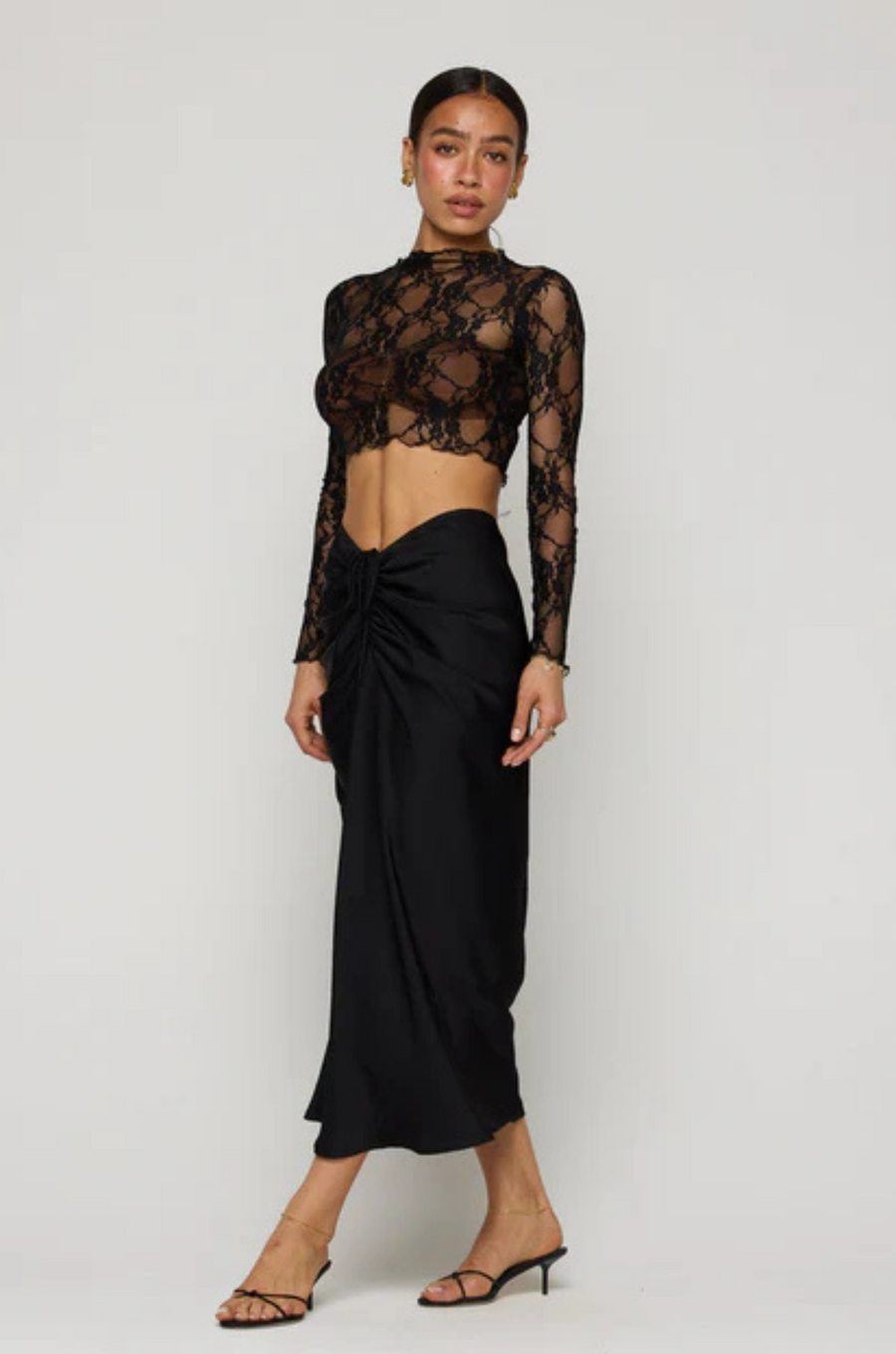 black Shirred maxi skirt
Elastic stretch waist with front tie cinch
Zipper up back closure
Polyester