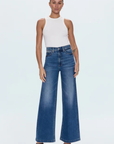 Relaxed, ultra wide leg silhouette
High rise waist
Comfort stretch denim
Waist: 26" / Rise: 12" / Length: 33"
Cotton/Spandex
medium wash blue denim jeans