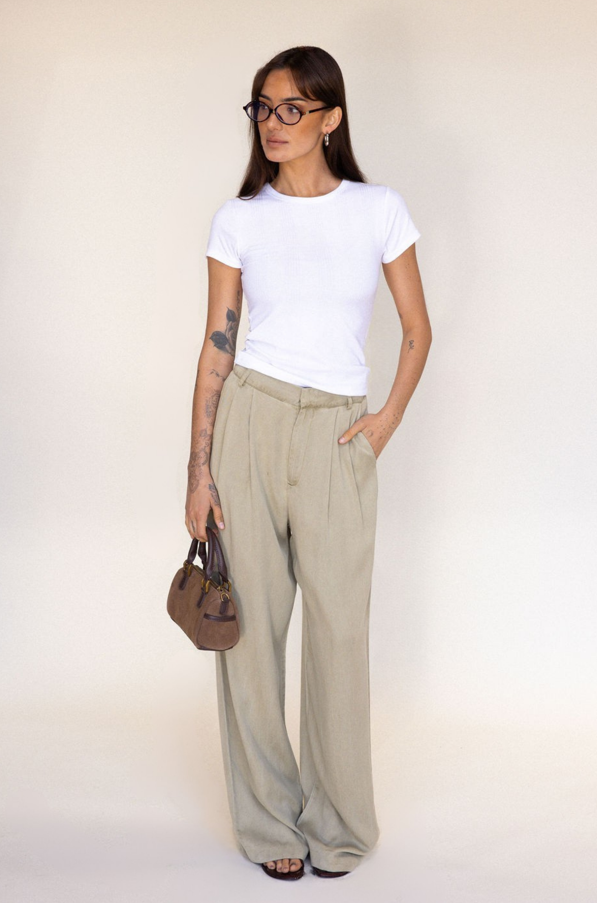 tan beige High waisted trouser pant
Belt loops
Eyelet and zipper closure
Front pleats
2 side pockets
2 faux back pockets
Unlined
work trouser pants
cute office attire
dressed up outfit