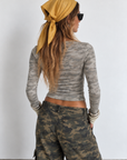 Camo printed long sleeve shirt
yellow Striped neckline and arm hem
Crew neckline
Unlined
thumb holes