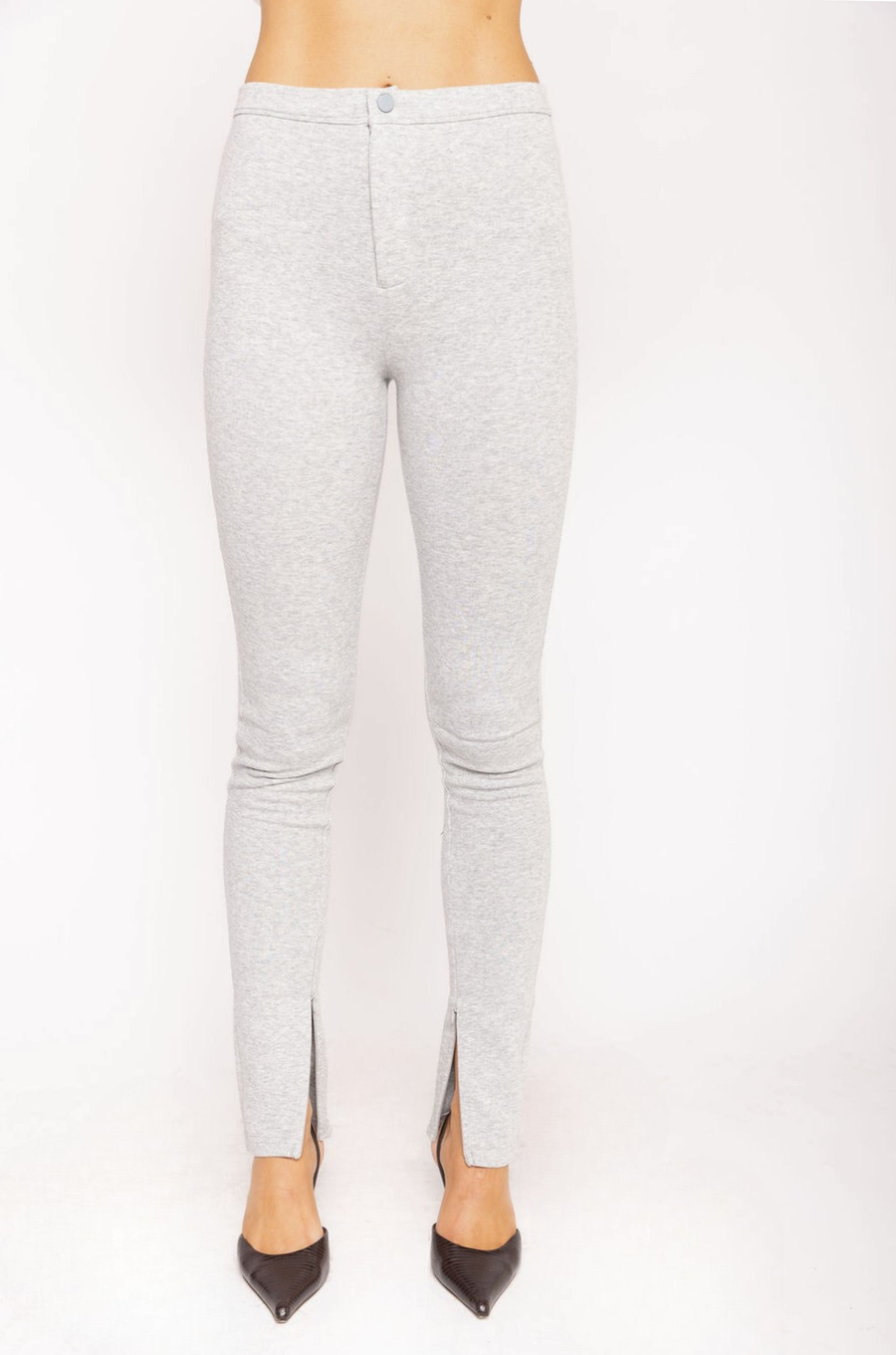 Jersey stretch split hem leggings
Button fly closure
Zipper slit hem
Unlined
light grey legging pants with inner size zipper on hem