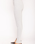Jersey stretch split hem leggings
Button fly closure
Zipper slit hem
Unlined
light grey legging pants with inner size zipper on hem