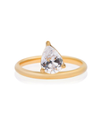 Classic gold band set with an angled pear-cut CZ crystal
Tarnish-free, waterproof, and hypoallergenic
Backed by Ginneca Row's lifetime guarantee, including replacement if it ever tarnishes or loses stone integrity