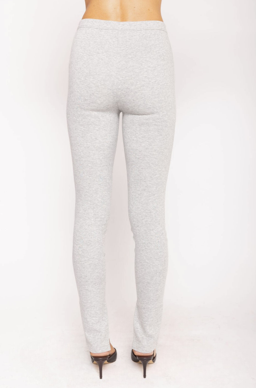 Jersey stretch split hem leggings
Button fly closure
Zipper slit hem
Unlined
light grey legging pants with inner size zipper on hem