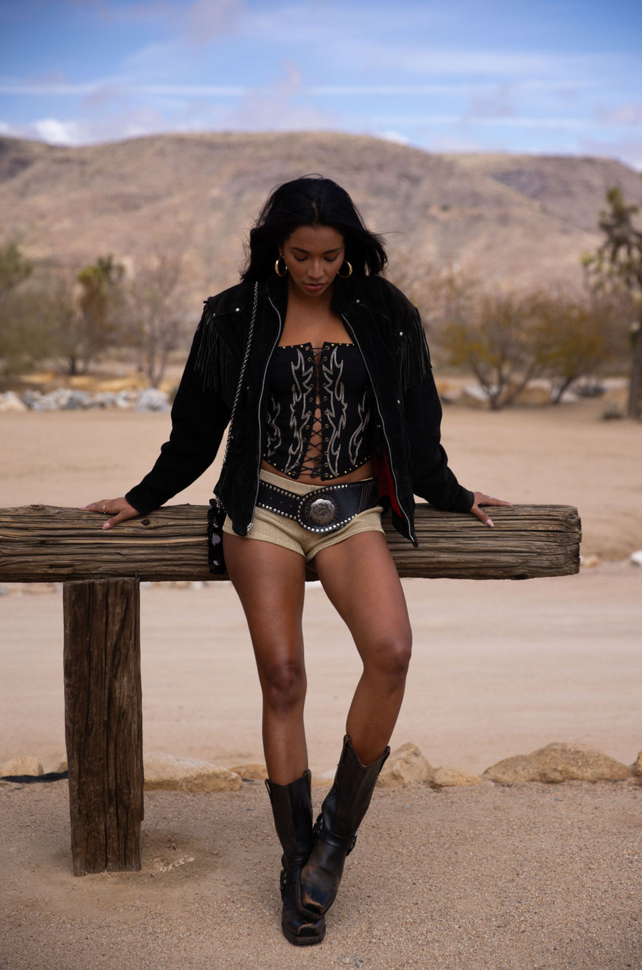 black Embroidered knit corset
Adjustable halter tie neck
Front lace up closure
Back hook and eye and zipper closures
Fully lined
Studded details
coachella top outfit
stagecoach top outfit
festival top outfit