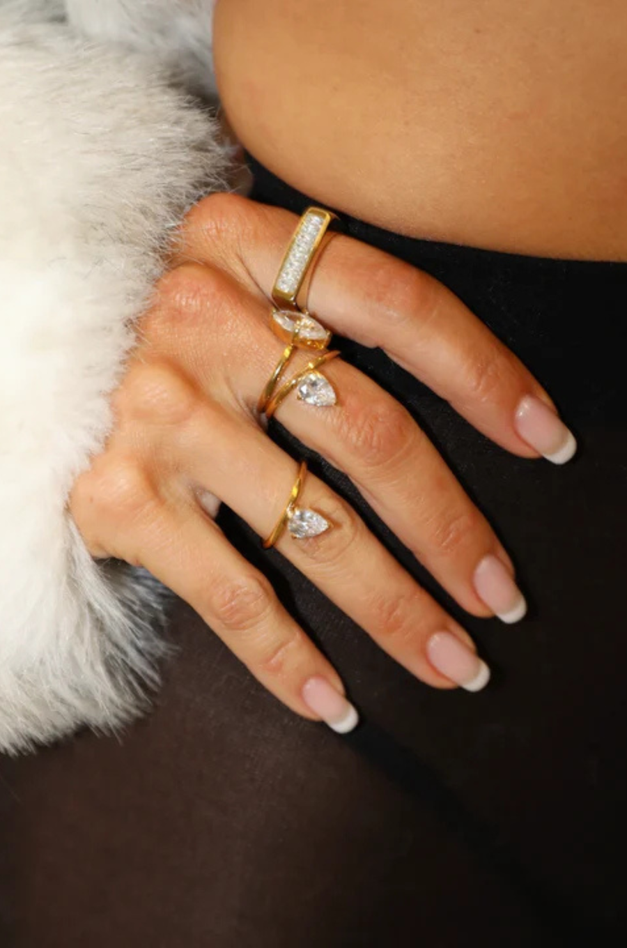 Classic gold band set with an angled pear-cut CZ crystal
Tarnish-free, waterproof, and hypoallergenic
Backed by Ginneca Row's lifetime guarantee, including replacement if it ever tarnishes or loses stone integrity