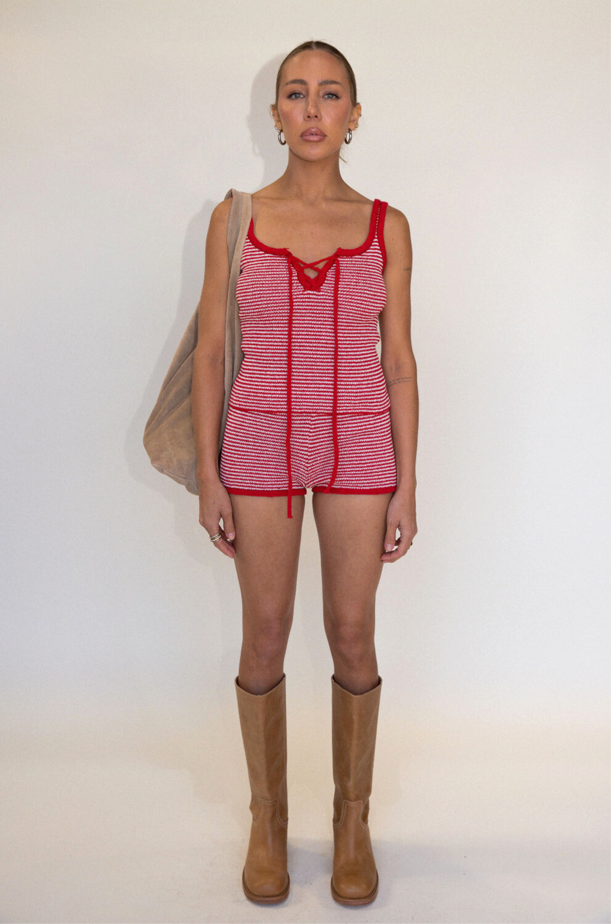 red and white Striped knit mini shorts
Has stretch
Unlined