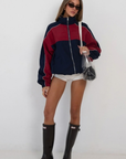 red and blue Windbreaker track jacket
Reversible into plaid
Lined
Zipper closure
Funnel neck
fall transition outfit