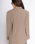 Oversized single breasted blazer
Collar neckline
Long sleeves with button closures
Front button down closure
Front pockets
Back slit
Fully lined
Length: 28"
Polyester/Spandex
tan beige oversized blazer jacket