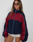 red and blue Windbreaker track jacket
Reversible into plaid
Lined
Zipper closure
Funnel neck
fall transition outfit