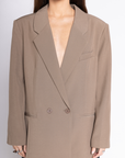 Oversized single breasted blazer
Collar neckline
Long sleeves with button closures
Front button down closure
Front pockets
Back slit
Fully lined
Length: 28"
Polyester/Spandex
tan beige oversized blazer jacket