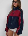 red and blue Windbreaker track jacket
Reversible into plaid
Lined
Zipper closure
Funnel neck
fall transition outfit
