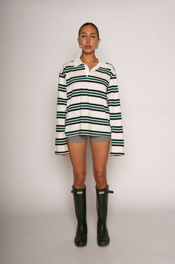 Striped knit top. Collar neckline. Front button closures. Long sleeves. Unlined. striped polo long sleeve. fall top. fall outfit