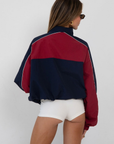 red and blue Windbreaker track jacket
Reversible into plaid
Lined
Zipper closure
Funnel neck
fall transition outfit