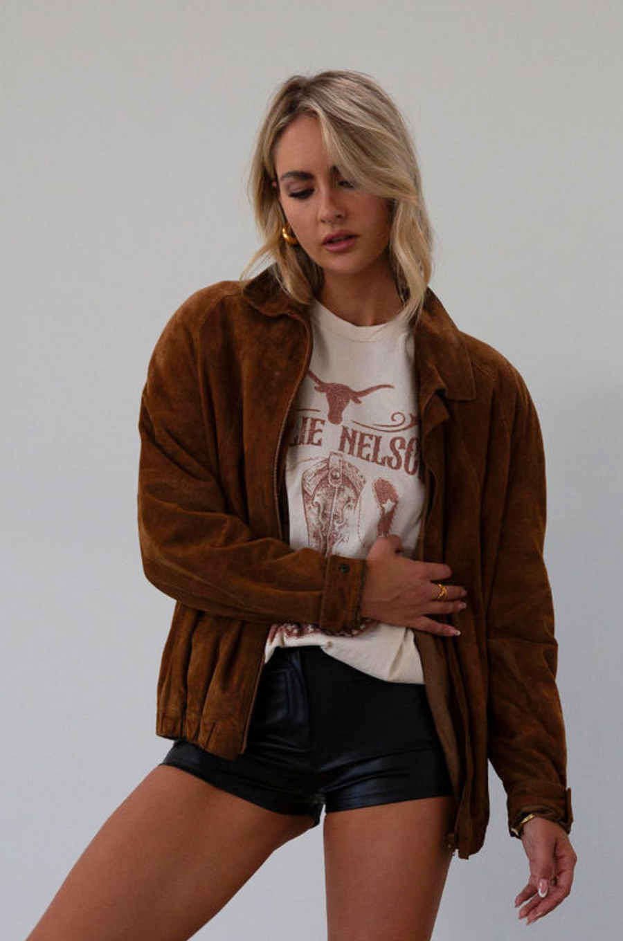 Vegan leather shorts. Hook and eye and zipper fly. No pockets. Unlined. black faux leather shorts. fall shorts. fall outfit. 
