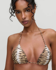 Zebra printed triangle bikini top
Adjustable neck and back tie
Crafted in our signature SoftSwim™ Satin fabric
Halter support
Skimpy triangle coverage
Ruched detailing
Nylon/Spandex
Exclusively from the Devon Lee Carlson x Frankies Bikinis collection: Sunshine Girls