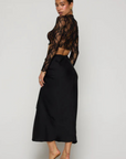 black Shirred maxi skirt
Elastic stretch waist with front tie cinch
Zipper up back closure
Polyester