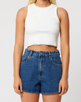 High rise, loose fit denim shorts
medium wash denim shorts
Crafted with a comfort rigid denim meaning they will be fitted when first worn and will slowly soften and mold to your body after wash &amp; wear
Zip fly