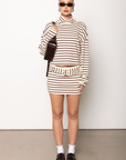 cream and burgundy Striped knit mini skirt
Inner shorts lining
Attached adjustable knit belt
Side zipper closure
holiday outfit
holiday mini skirt