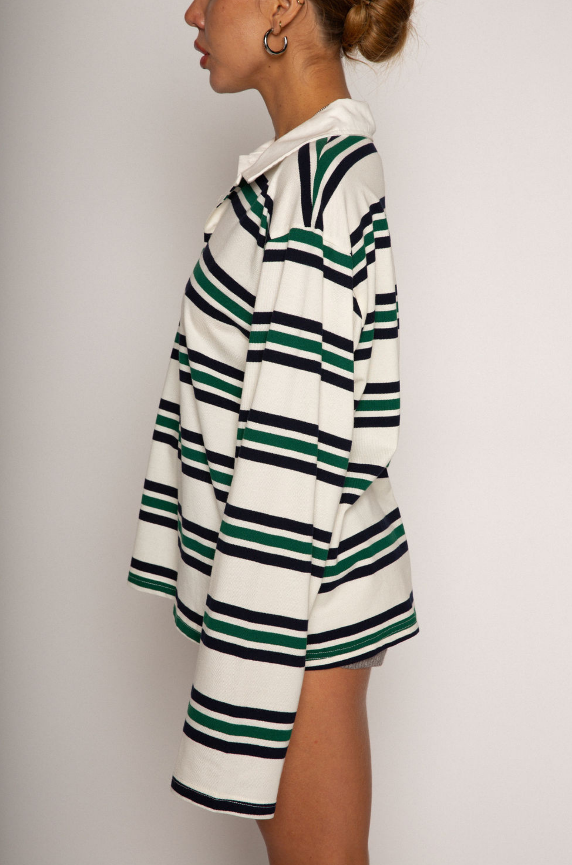 Striped knit top. Collar neckline. Front button closures. Long sleeves. Unlined. striped polo long sleeve. fall top. fall outfit