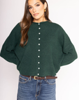 Fuzzy knit cardigan
Crewneck
Front button down closures
Long sleeves
Unlined
green cardigan
christmas sweater
christmas outfit