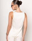 cream ivory Satin tank top
Sleeveless
U neckline
Unlined
Length: 22.5"
Polyester/Rayon
