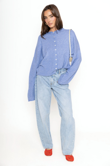 Fuzzy knit cardigan
Crewneck
Front button down closures
Long sleeves
Unlined
blue cardigan
