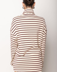 cream and burgundy Striped turtle neck long sleeve top
Fold over turtle neck
Unlined
holiday outfit
striped long sleeve top