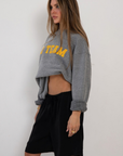 Oversized Raglan "Go Team" Crew sweatshirt
Relaxed fit with an effortlessly sporty feel
Designed with dropped shoulders and a loose silhouette
50% polyester, 38% cotton, 12% rayon
grey go team sweatshirt