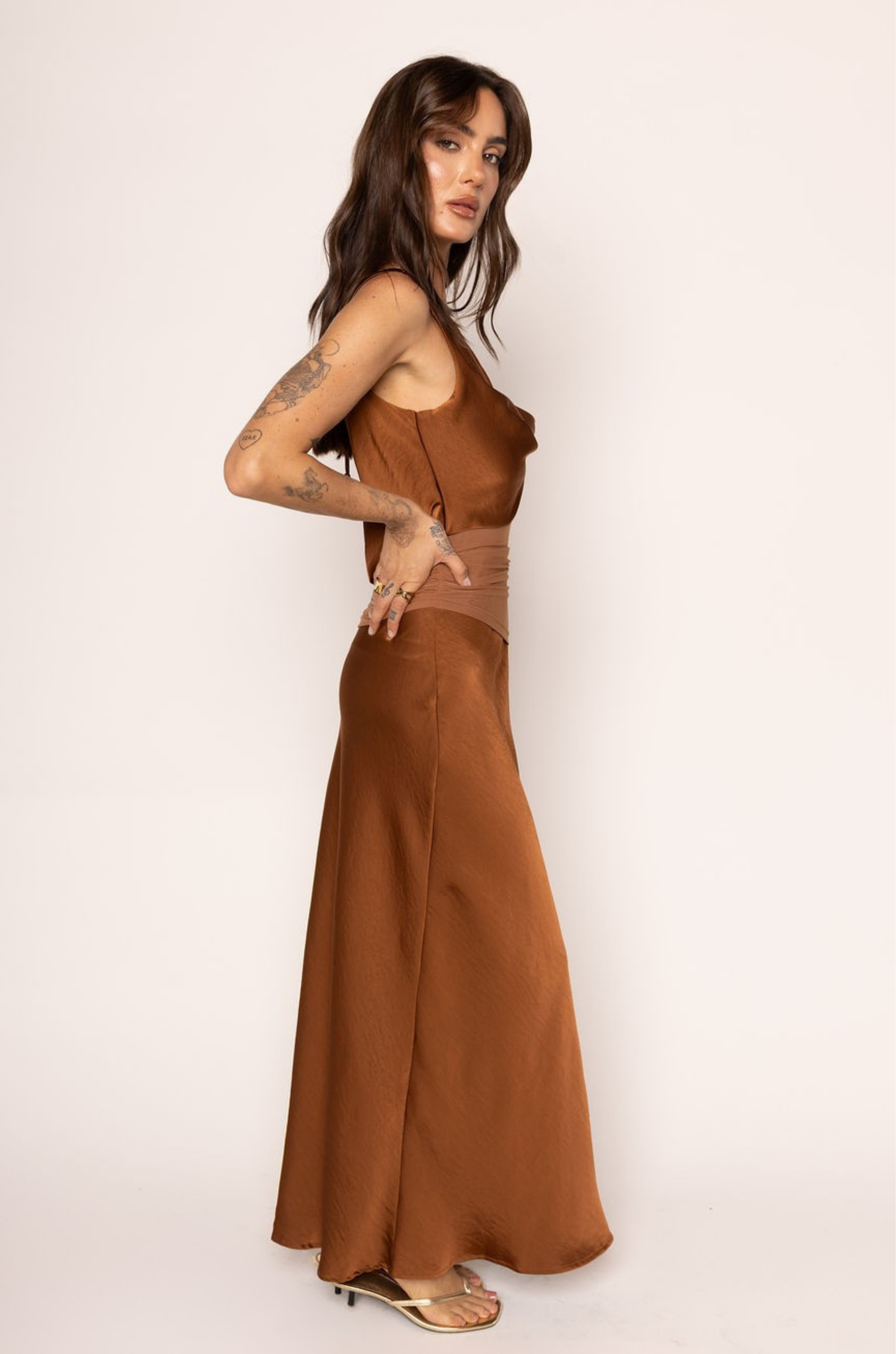 brown Satin maxi dress
Cowl neckline
Mesh waist detail
Low back cowl
Adjustable back tie
Side zipper closure
Partially lined
brown wedding guest dress
fall wedding guest dress
western wear wedding guest dress