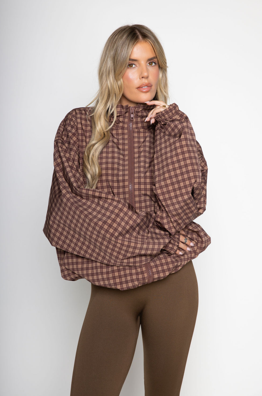 brown Gingham printed windbreaker jacket
Front zipper closure
Adjustable cinch-able hem and arm hem
Side pockets
Partial inner mesh lining
fall windbreaker
cute windbreaker
fall workout outfit