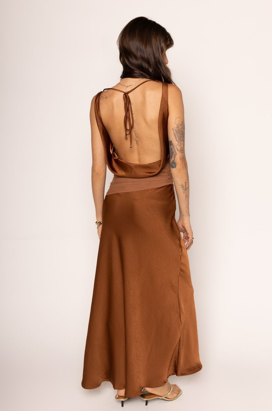 brown Satin maxi dress
Cowl neckline
Mesh waist detail
Low back cowl
Adjustable back tie
Side zipper closure
Partially lined
brown wedding guest dress
fall wedding guest dress
western wear wedding guest dress