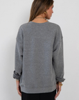 Oversized Raglan "Go Team" Crew sweatshirt
Relaxed fit with an effortlessly sporty feel
Designed with dropped shoulders and a loose silhouette
50% polyester, 38% cotton, 12% rayon
grey go team sweatshirt