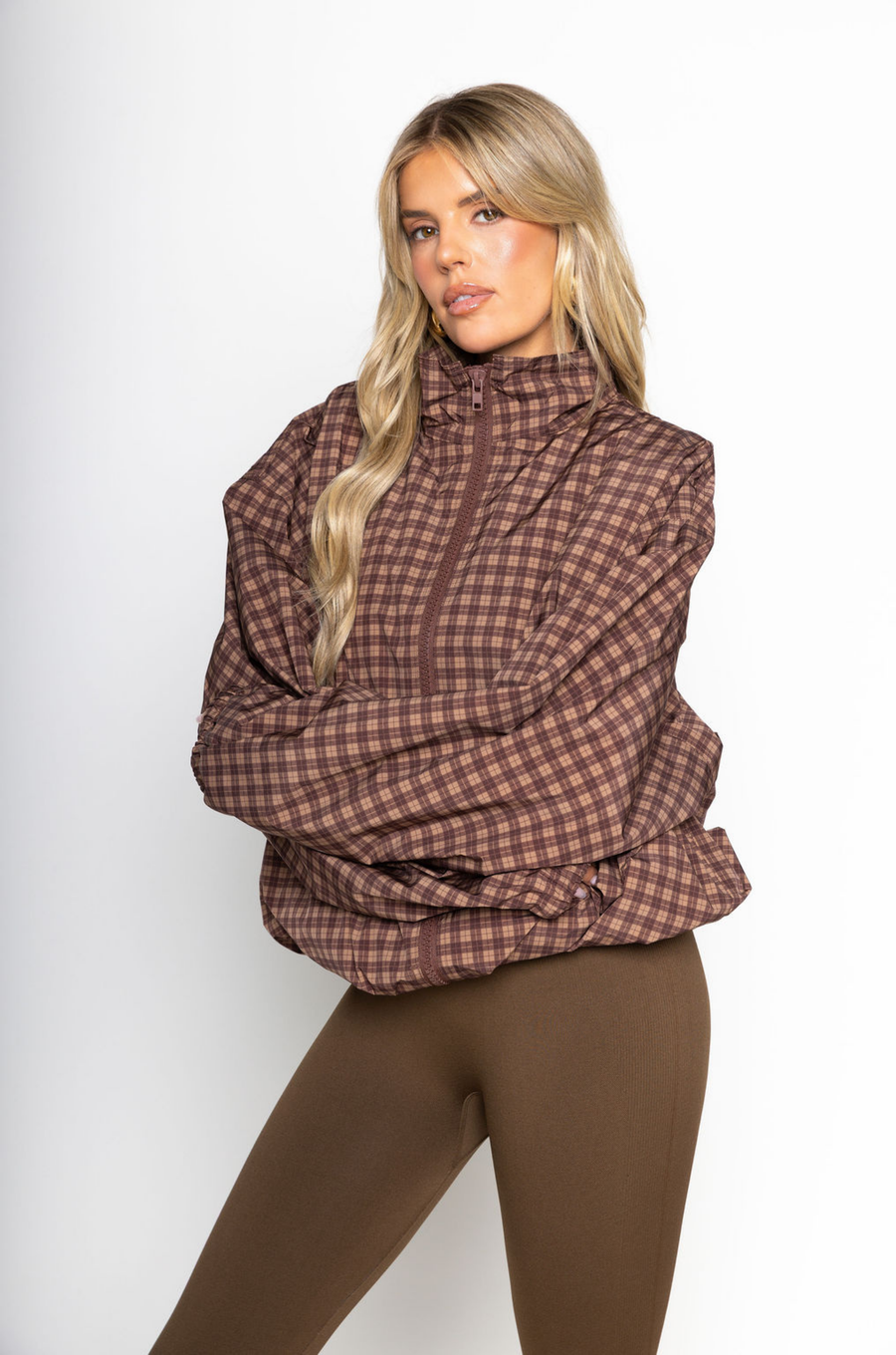 brown Gingham printed windbreaker jacket
Front zipper closure
Adjustable cinch-able hem and arm hem
Side pockets
Partial inner mesh lining
fall windbreaker
cute windbreaker
fall workout outfit