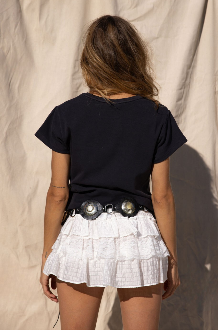 white lace detailing mini skirt with inner shorts. stagecoach skirt outfit. country concert outfit. festival outfit