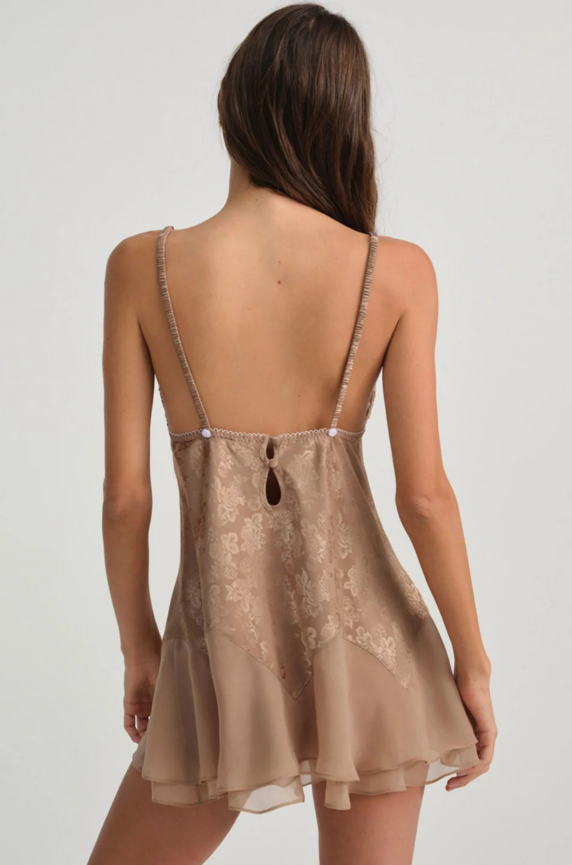 chocolate brown Satin slip dress
Floral jacquard bodice
Lace triangle cups
Chiffon skirt
Adorned with contrast rosettes and a decorative bow at the center-front
Fully lined
Adjustable shoulder straps
Functional keyhole and covered button at back neckline
Polyester/Elastane