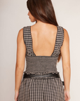 black and white Gingham printed V-neckline tank top
Contrast bow detail
Wide supportive shoulder straps
Smocked bodice
Low-cut back
Ruffle hem
Lined
spring top