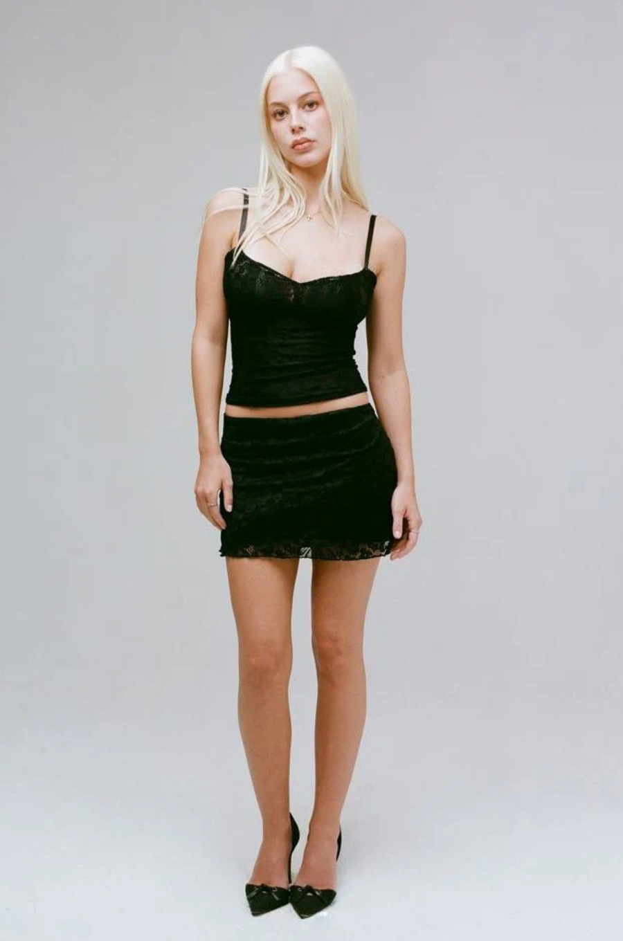 Sheer lace tank top
Adjustable straps
Back clasp
Lined/Sheer
black lace tank top