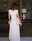 white Ruched maxi skirt
Elastic waistband
Front slit
Lined
resort outfit