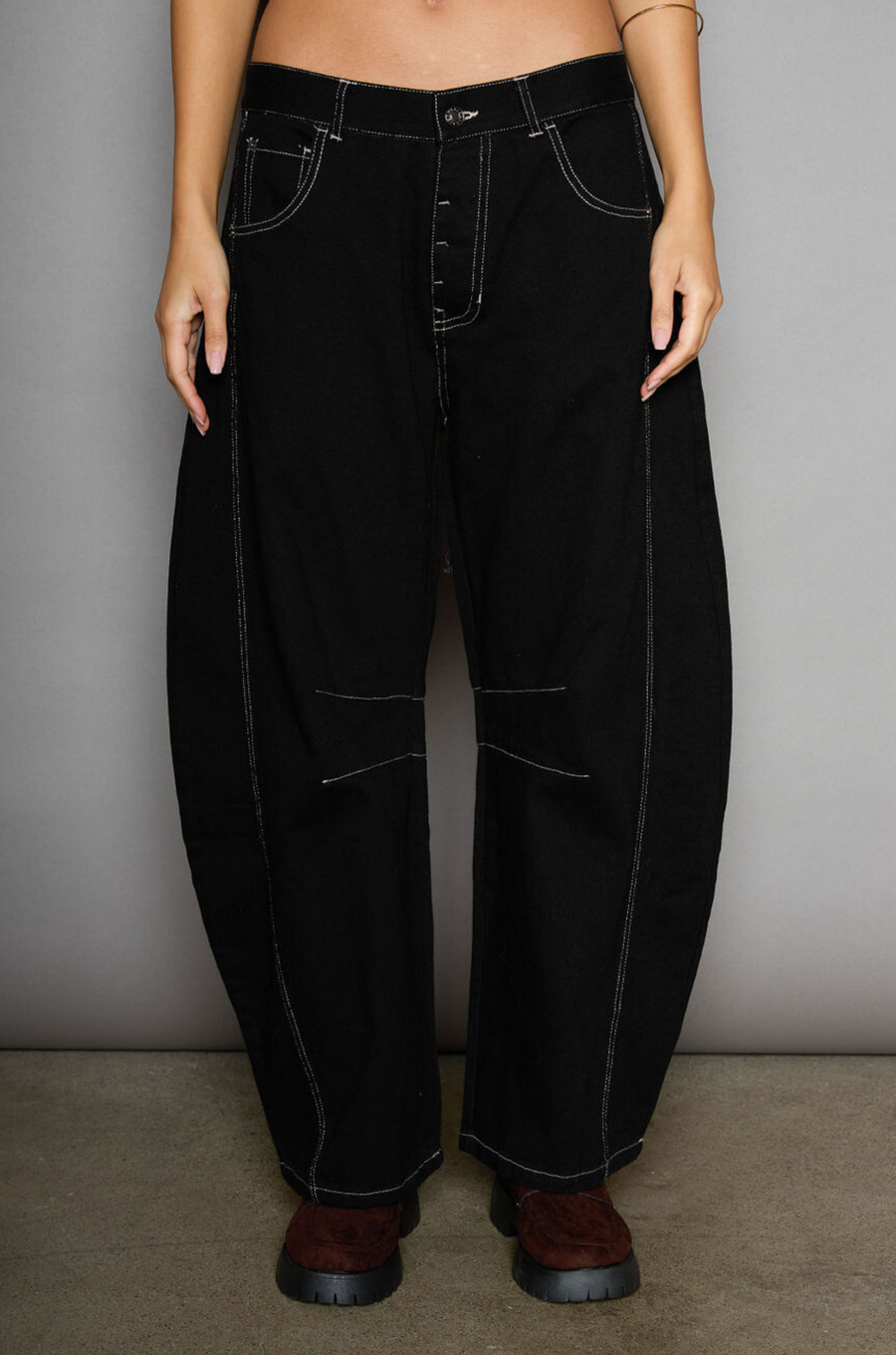 black Barrel leg jeans. Contrast stitching. Button fly. Five pocket construction. Unlined. fall jeans. fall pants. fall outfit. winter outfit. winter pants