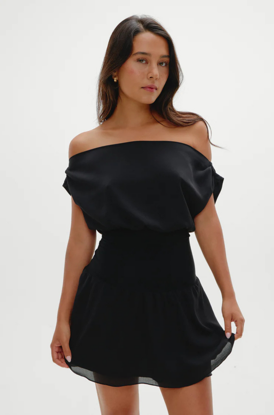 Stretchy knit midsection
Contrasted by lightweight chiffon through the neckline, bodice, and skirt
Wide neckline
Sits naturally as a boat neck and can be styled on or off the shoulders
Double layer skirt
Polyester
black mini dress