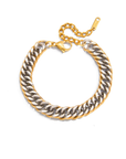 Two toned chain bracelet
Water Resistant Stainless Steel /Tarnish Resistant
Measurement: 6.5" with 1.5" Extender
The silver center links are framed with warm gold detailing